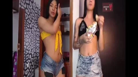 Two tranny Traps Dancing And Smoking A Cigarrete